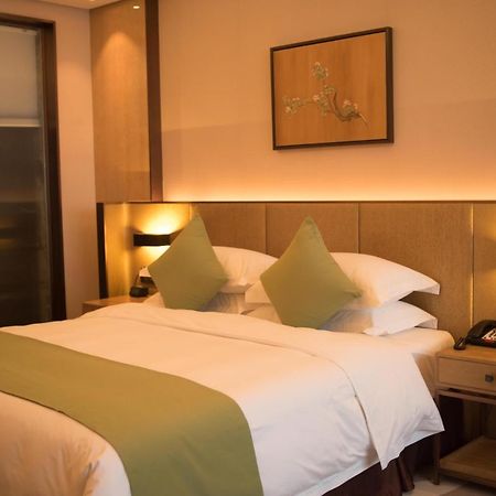 Leshan Ramada Hotel מראה חיצוני תמונה