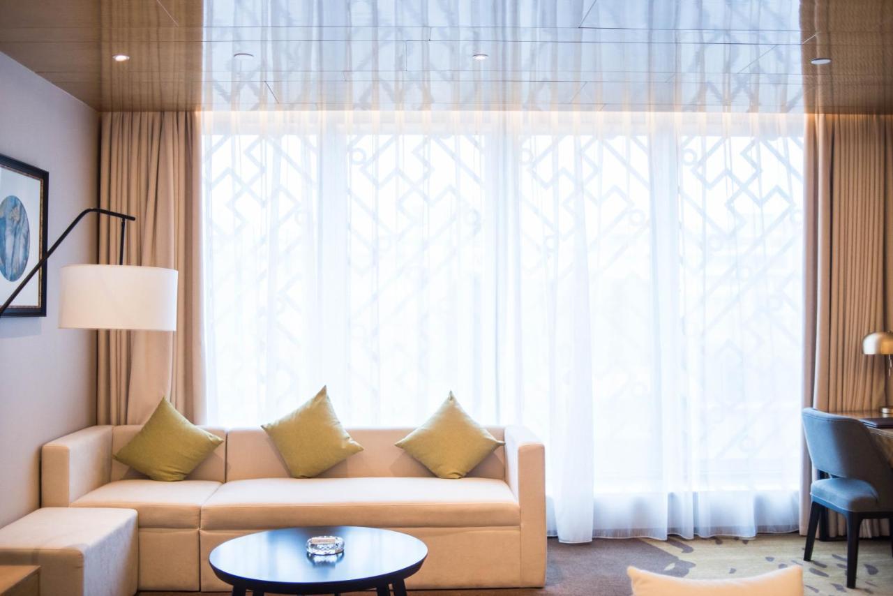Leshan Ramada Hotel מראה חיצוני תמונה