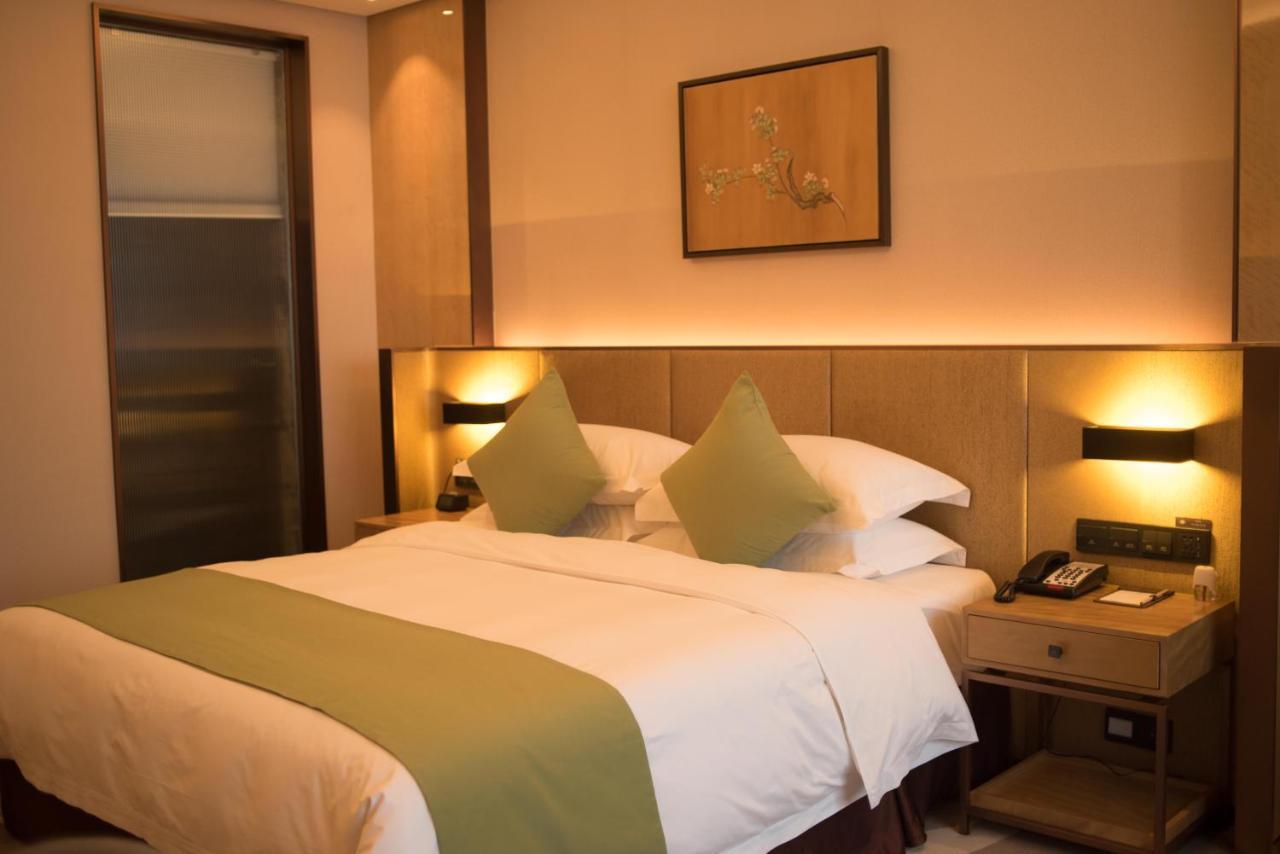 Leshan Ramada Hotel מראה חיצוני תמונה