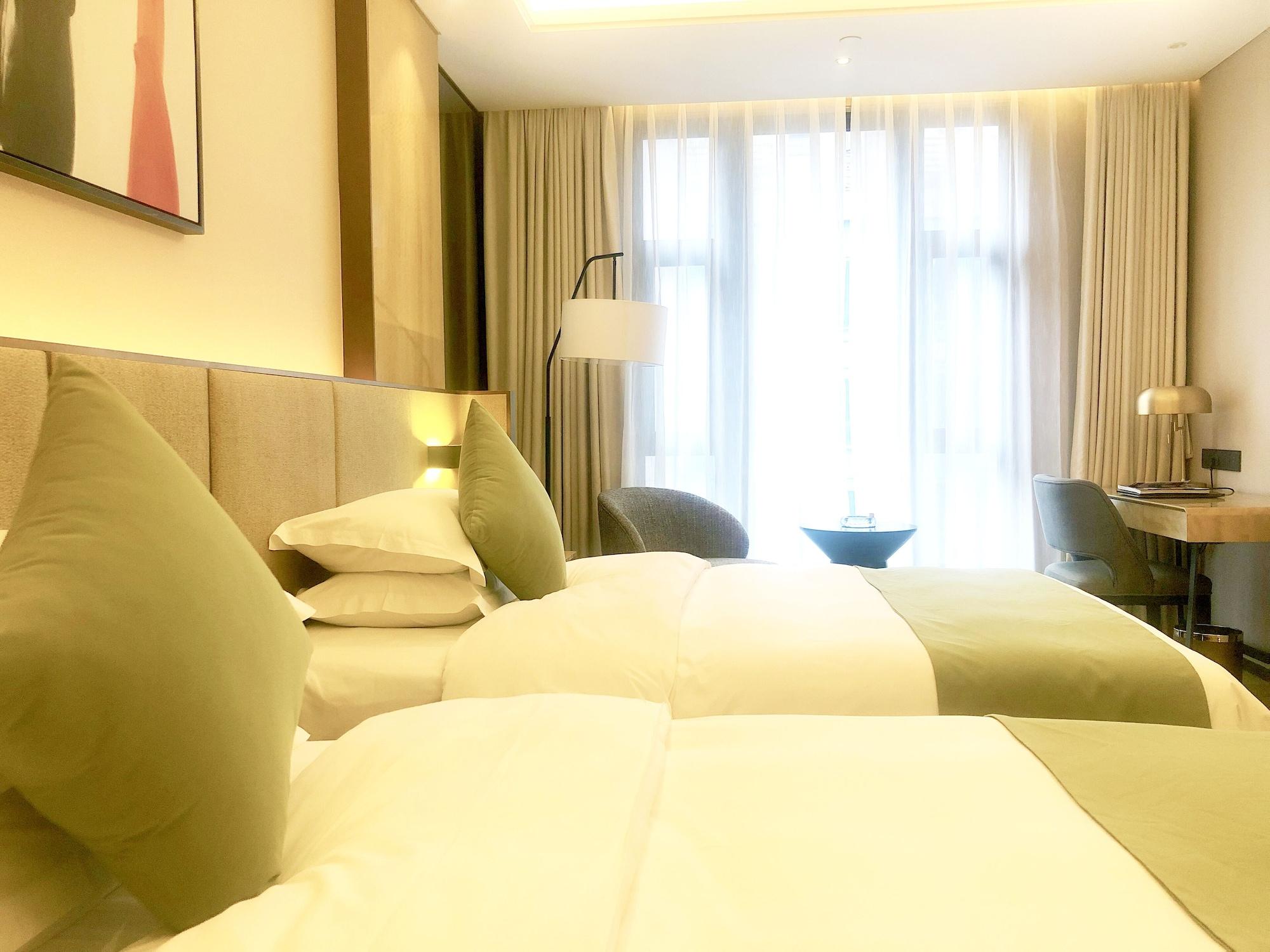 Leshan Ramada Hotel מראה חיצוני תמונה